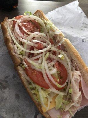 Turkey, ham and cheese on a sub roll $12