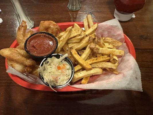 Beer battered shrimp, fries and Cole slaw.