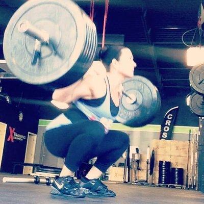 Stacey back squatting for 10 rep max.