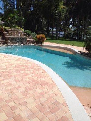 Pool patio installation completed.