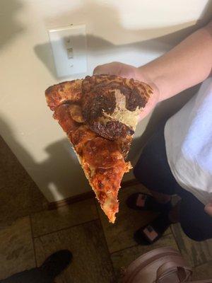 This is one the pieces of pizza we got today in a Wednesday. Don't recommend this place