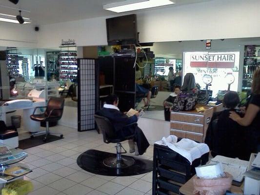 Inside, 3 chairs, mani-pedis & sunglasses-$9.99.