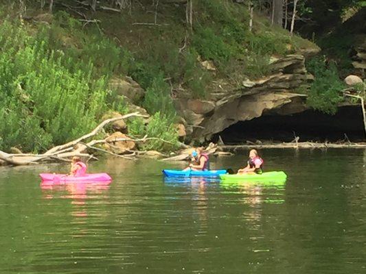 Kids taking Kayaks up the lake to see the "caves."