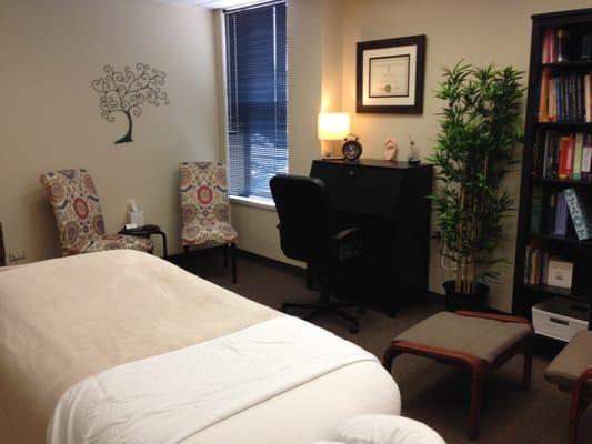 Treatment room 1--We treat kids in this room, and adults.  It has a comfy chair with a footstool for nursing moms, and toys for kids.