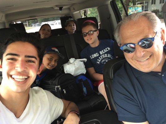 Bob and some of his young passengers on the way to summer camp (2019 pre-Covid)