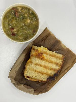 Cup of gumbo and half grilled cheese