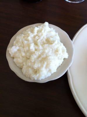 Side of grits... Cooked very well