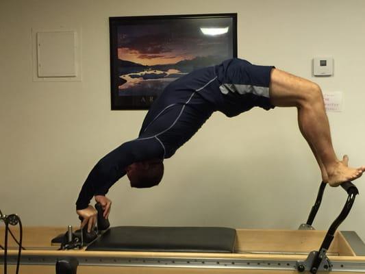 Wheel pose on Reformer