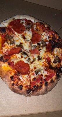 Pepperoni and sausage pizza