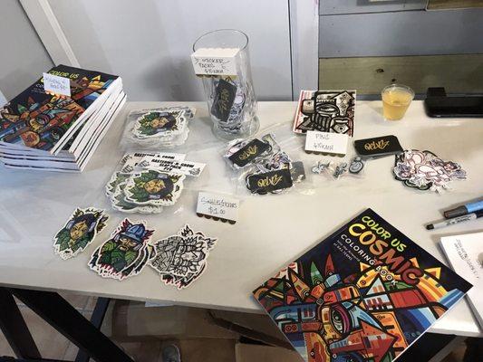 Stickers, pins and coloring books for sale!