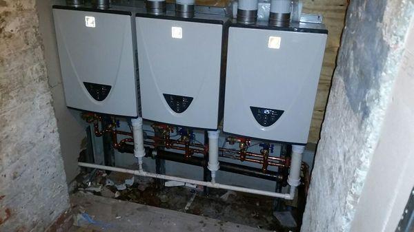 3 Takagi TH1 199,000 BTU'S linked in tandem instant hot water heater install