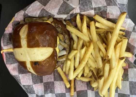 Pick Axe Burger on Pretzel Bun, served with French Fries. June, 2023.