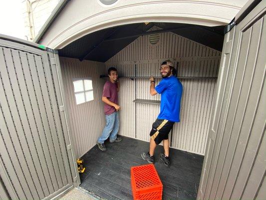 Team members Vaughan and Joe completing a shed build