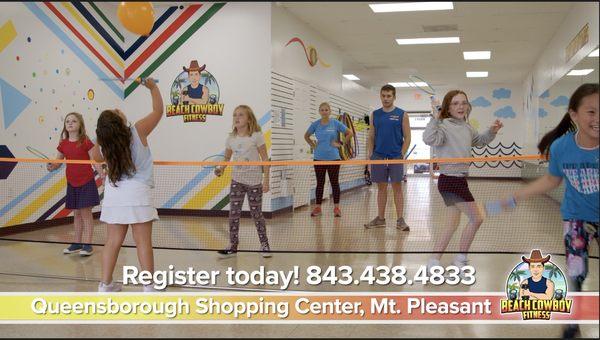 A home-school group learning badminton.