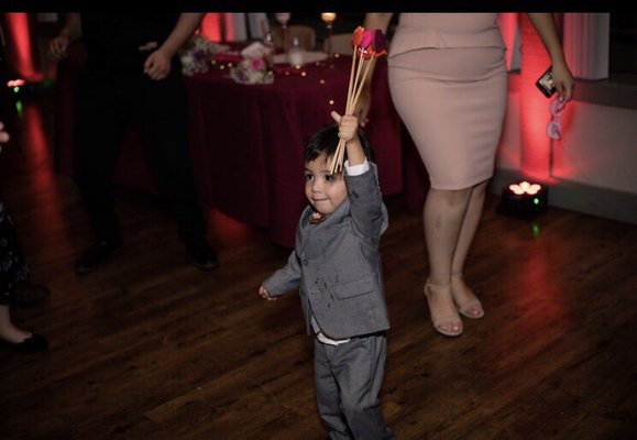 My nephew holding some of the props from the photo booth