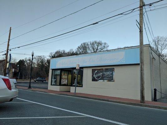 Store front with free parking across the street, plenty of spots.