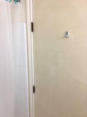 Bathroom door and shower rods