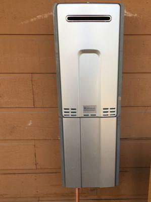 Rinnai, non condensing tankless water heater on exterior wall