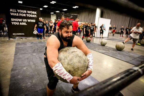 Trainer/ coach Shane Mclain at competing in strongman.