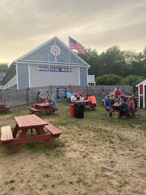 If you can snag a table father away on the slope you won't be packed in like sardines and the music and ambient noise won't be as loud.