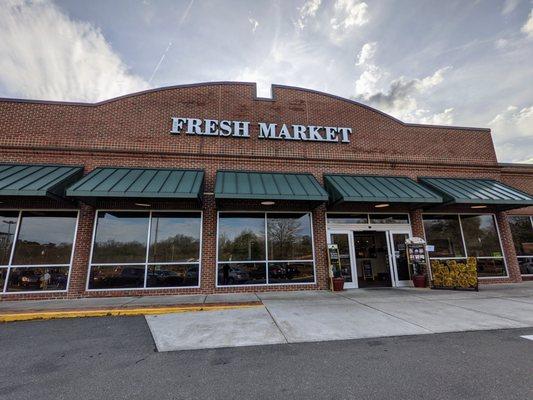 Outside of The Fresh Market in Chapel Hill. Located in the Glenwood Square shopping center. I took this storefront photo on 2/28/2021.