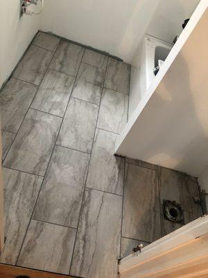 Tile floor of bathroom remodel