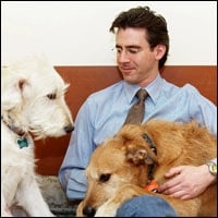 Dr. Andrew Kaplan, owner, and his pets