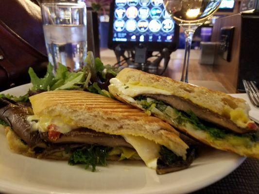 Yummy panini, portabella mushroom, leeks, baby kale, mozzarella.  Comes with side salad.