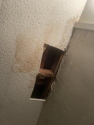 This is the hole that is STILL leaking that was cut bigger and just left like that wild mold mildew and all