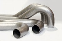 Sharpe custom pipe bending servics: 4" O.D. steel mandrel bent tube.