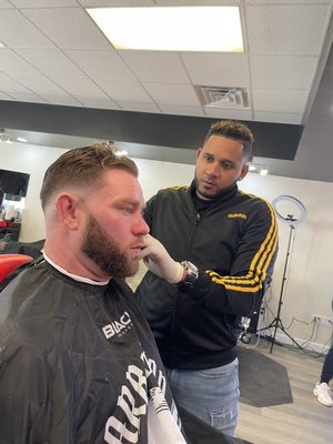 Mid-skin fade whit beard line up