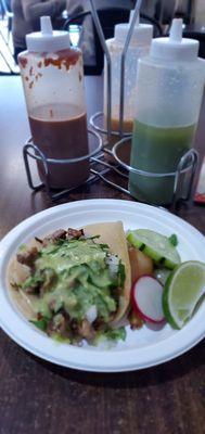 Taco Carne Asada .  The green sauce is OK little watered down for me.  The other 2 bottle sauces meah.