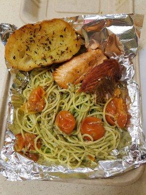 Seared Salmon over Tomatoes, Pesto, Chili, Spaghetti and Parmesan with Garlic Bread