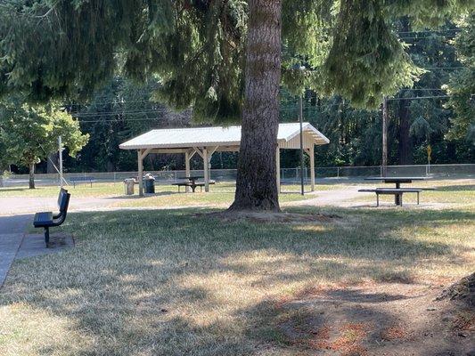 Shady picnic areas, benches, and room to play