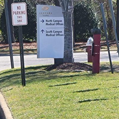 Sign leading patients to building from main road Coliseum Drive