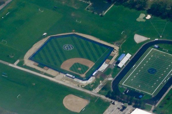 Figgie Field - Baseball facility featuring both artificial outfield and infield. Cutting down on working class maintenance crew.