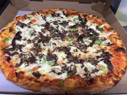 Cheese steak pizza