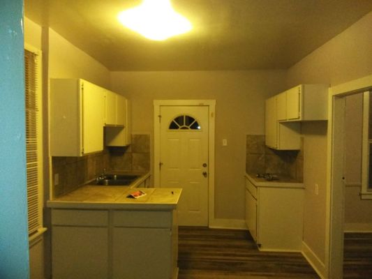 Finish kitchen new cabinets and tiles on counter the new floor