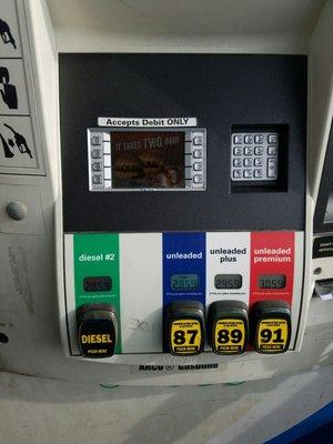 The gas pumps will only allow you to use a debit card and then there is a required charge to use the debit card.