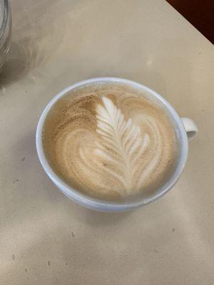 Latte in ceramic cup