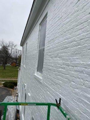 Three coats of exterior white paint