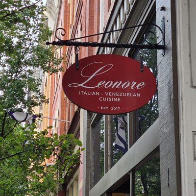 The outdoor sign of Leonore Restaurant.