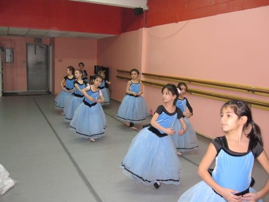 Level 1 dancers practicing in costume for their recital performance!