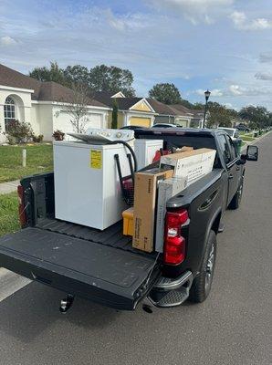 Appliance removal with garage declutter