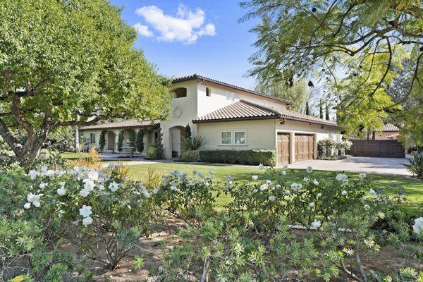 One-of-a-kind Tuscan-inspired estate sprawling across over a flat 3/4 acre lot with a cabana! Mostly single-story.