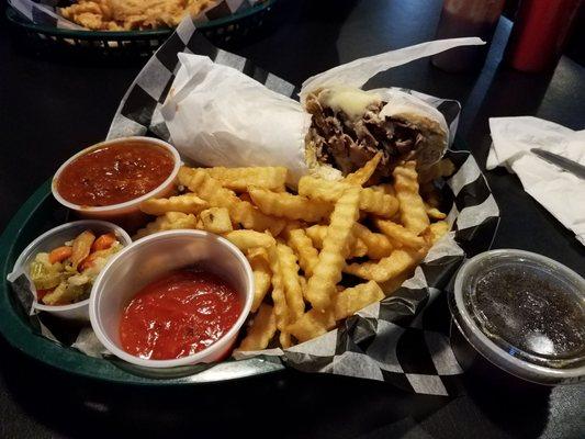 Italian beef sandwich basket with au jus, marinara and giardiniera on the side & chili