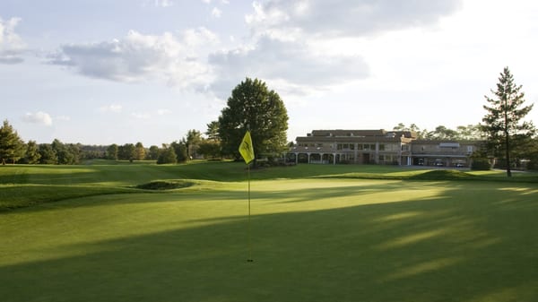 Our 18th green and clubhouse.  Enjoy all our club has to offer!