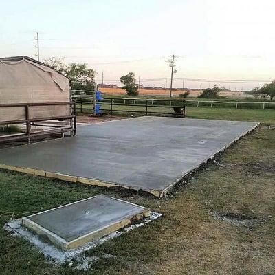 Concrete patio used as  horse stalls