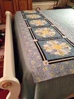 How about a Bed Runner & a set of pillowcases to match , instead of a whole quilt?