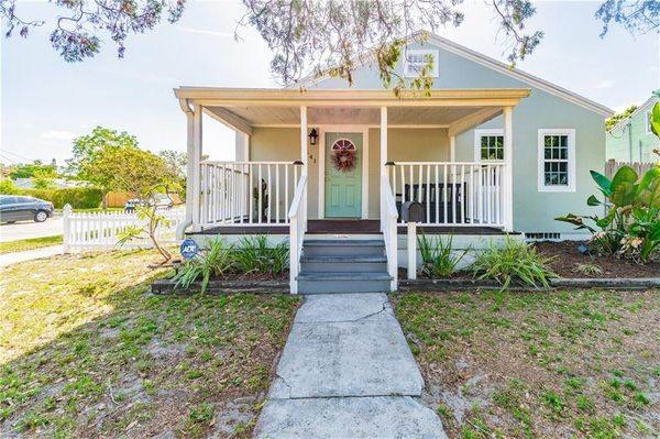 Corner property, welcoming front porch